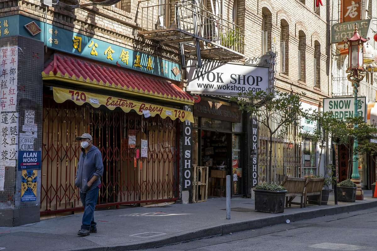 Shuttered businesses line Grant Avenue in S.F.’s Chinatown in August, months into the pandemic.