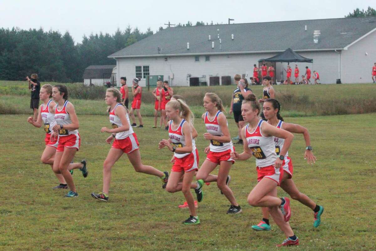 Chippewa Hills girls runners get off to the start of their home Wednesday cross country race. (Pioneer photo/John Raffel)