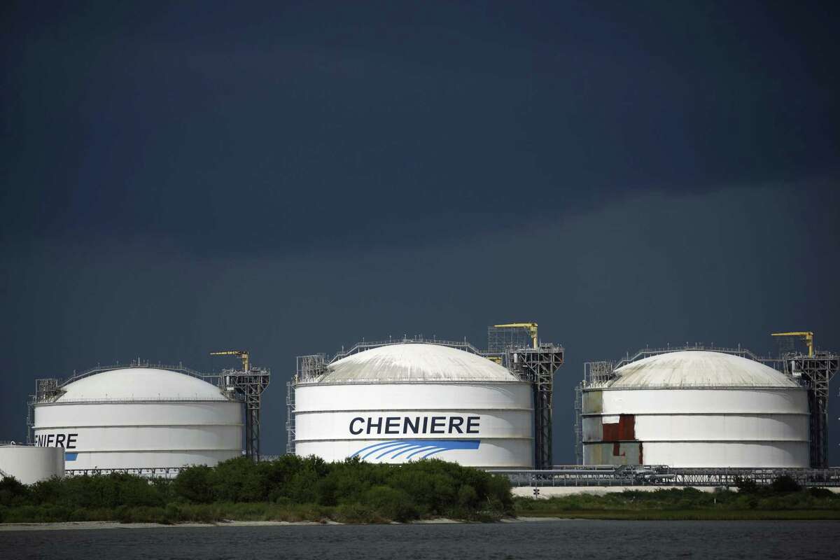 Storage tanks stand the Sabine Pass LNG Export Terminal ahead of Hurricane Laura in Sabine Pass, Texas, U.S., on Tuesday, Aug. 25, 2020. Hurricane Laura is poised to become a roof-ripping Category 3 storm when it comes ashore along the Texas-Louisiana coast, threatening to inflict as much as $12 billion of damage on the region and potentially shutting 12% of U.S. refining capacity for months. Photographer: Luke Sharrett/Bloomberg