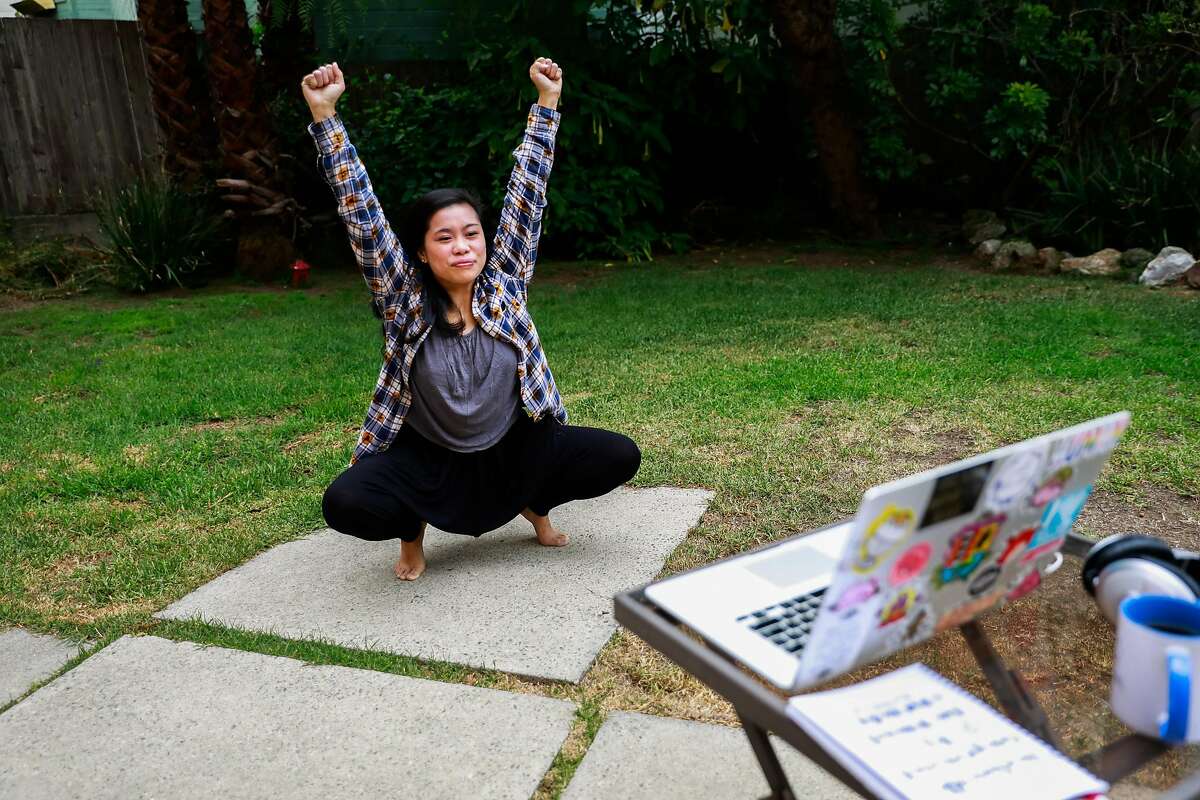 Nikki Me–ez practices mindfulness yoga exercises as a demonstration for the Chronicle in her back yard on Wednesday, Aug. 12, 2020 in San Francisco, California.