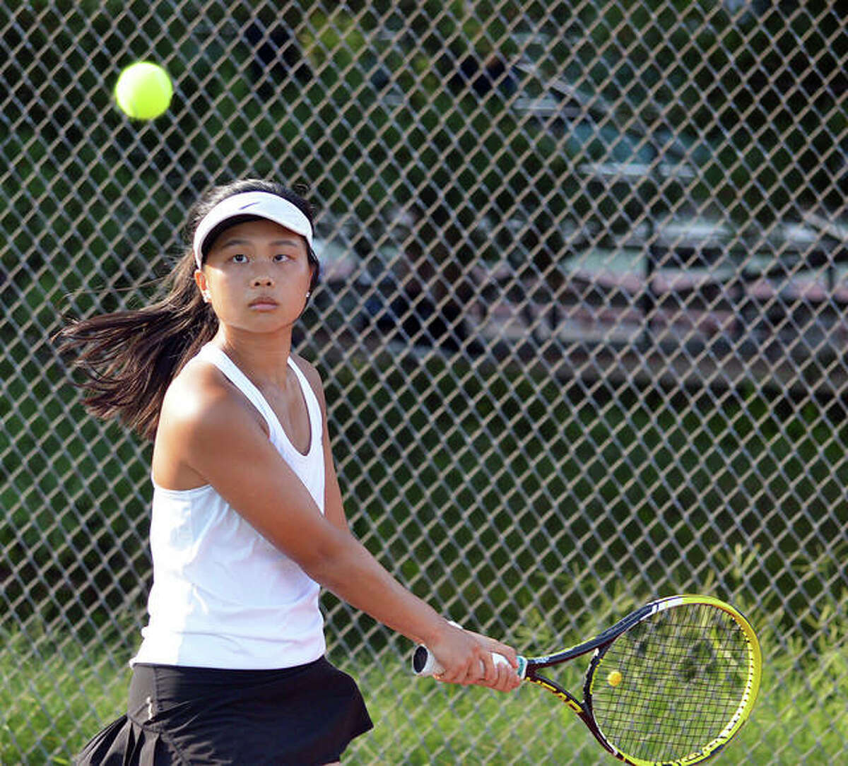 TENNIS: Tigers win big in opener