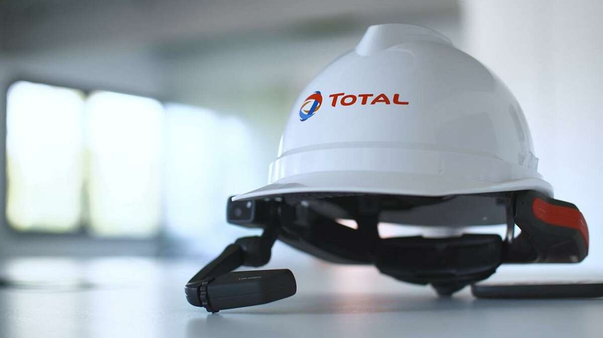 A test of high-tech helmets at French oil major Total's petrochemical plant in La Porte has led the company to deploy them as a COVID-19 safety measure at its facilities around the world.