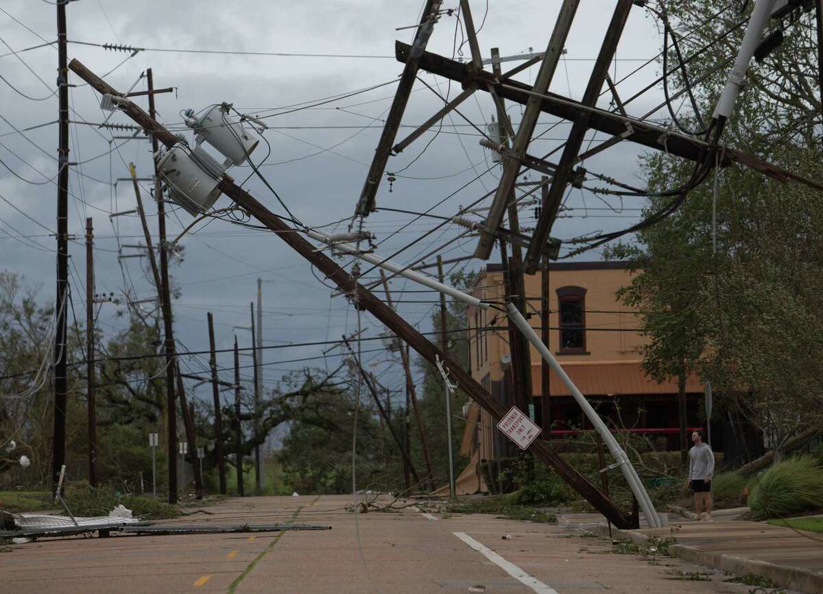 'Ferocious' Laura diminishes to tropical storm after leaving trail of ...