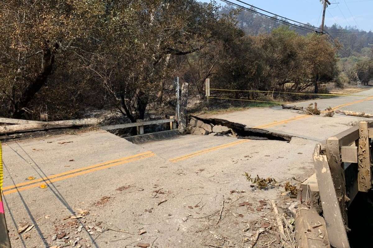 Intense heat from the CZU August Lightning Complex wildfires in Santa Cruz and San Mateo counties melted this section of asphalt road. "This is one of many hazards in the burn area," Cal Fire said in an Aug. 27, 2020, Twitter post. 