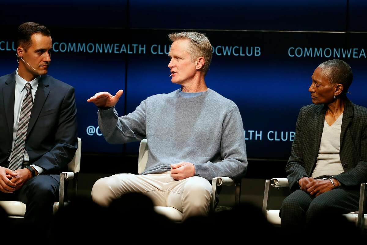 Steve Kerr speaks as Mike McLively and Thea James, MD, listen during Commonwealth Club Destination Health: Preventing Gun Violence panel discussion in San Francisco, Calif., on Wednesday, February 19, 2020.