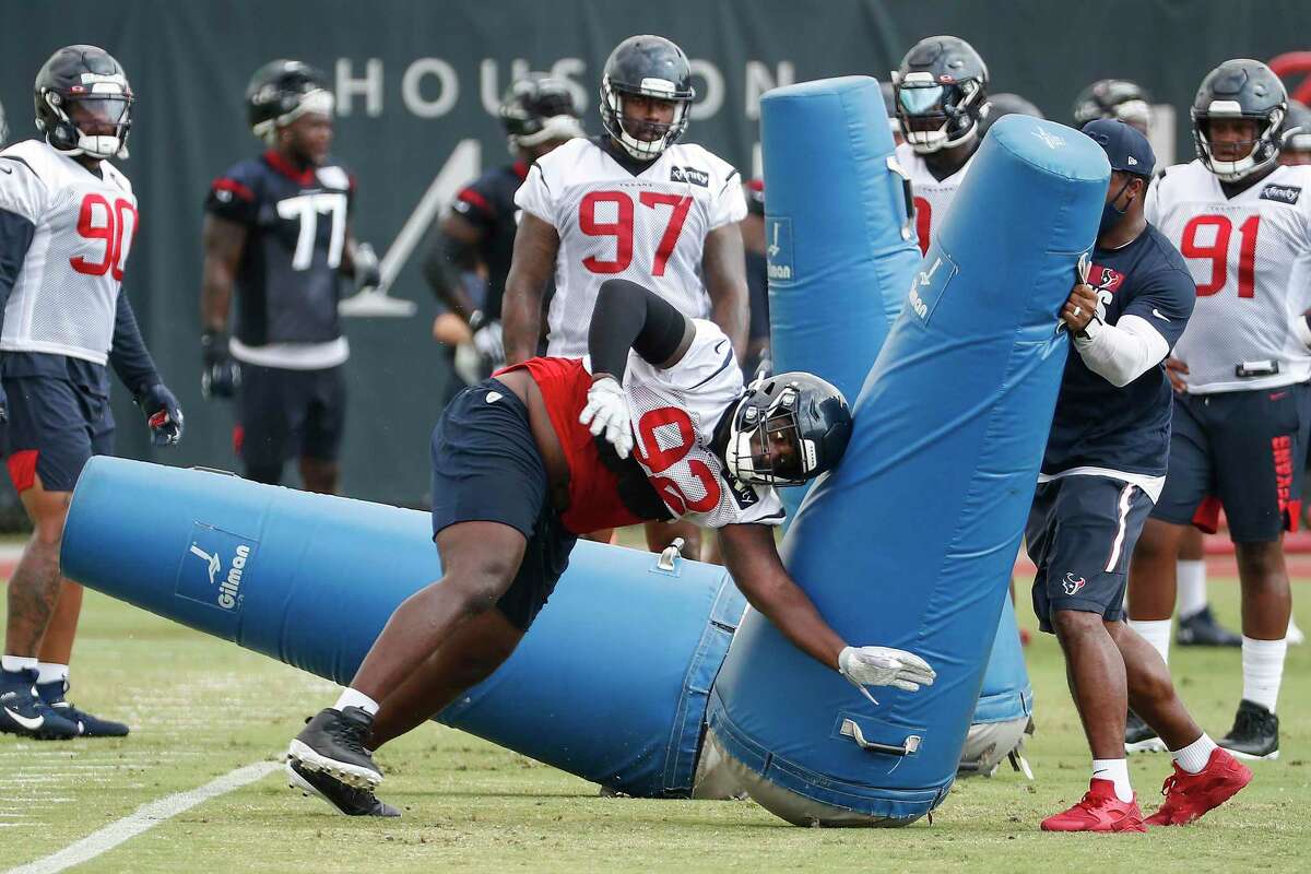 Houston Texans defensive end Angelo Blackson (97) runs onto the