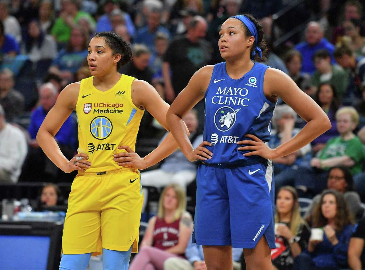 MINNEAPOLIS, MINNESOTA - MAY 25: Gabby Williams #15 of the Chicago Sky and Napheesa Collier #24 of the Minnesota Lynx stand on the court during their game at Target Center on May 25, 2019 in Minneapolis, Minnesota. The Lynx defeated the Sky 89-71. NOTE TO USER: User expressly acknowledges and agrees that, by downloading and or using this photograph, User is consenting to the terms and conditions of the Getty Images License Agreement. (Photo by Sam Wasson/Getty Images)