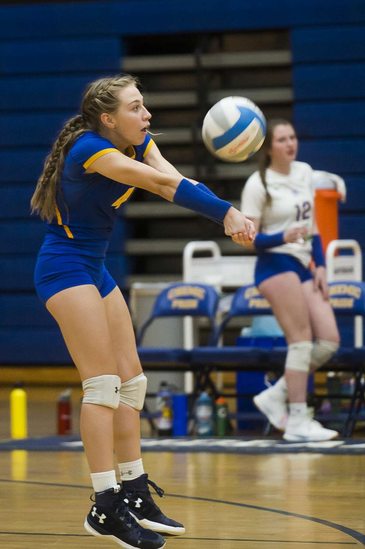 Midland High's Gabby Schloop passes the ball during a Nov. 6, 2019 district semifinal vs. Dow High.