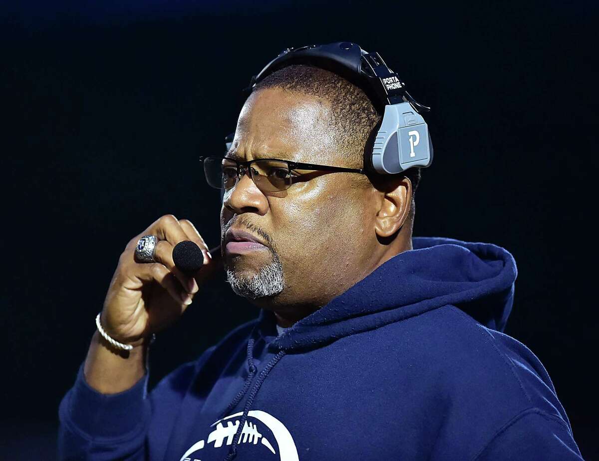 Hillhouse head coach Reggie Lytle on the sideline against Hand in the season opener for both teams in 2018 at Bowen Field in New Haven.