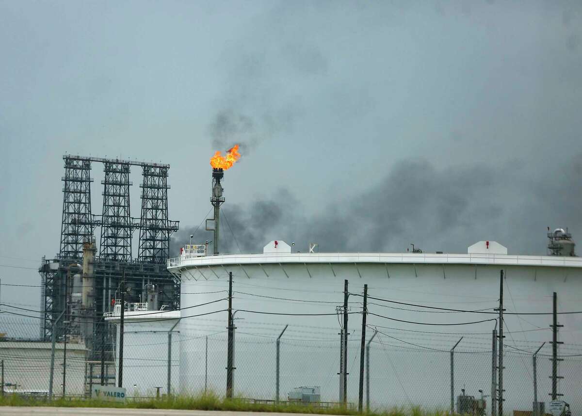A flare at the Valero Port Arthur Refinery in Port Arthur on Friday, Aug. 28. Refineries are beginning to restart after Hurricane Laura.