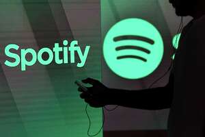 Spotify signs more influencers to deals