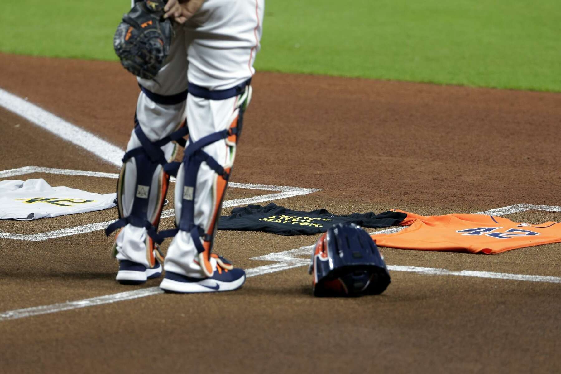 Astros, A's walk off field, choose not to play on Jackie Robinson