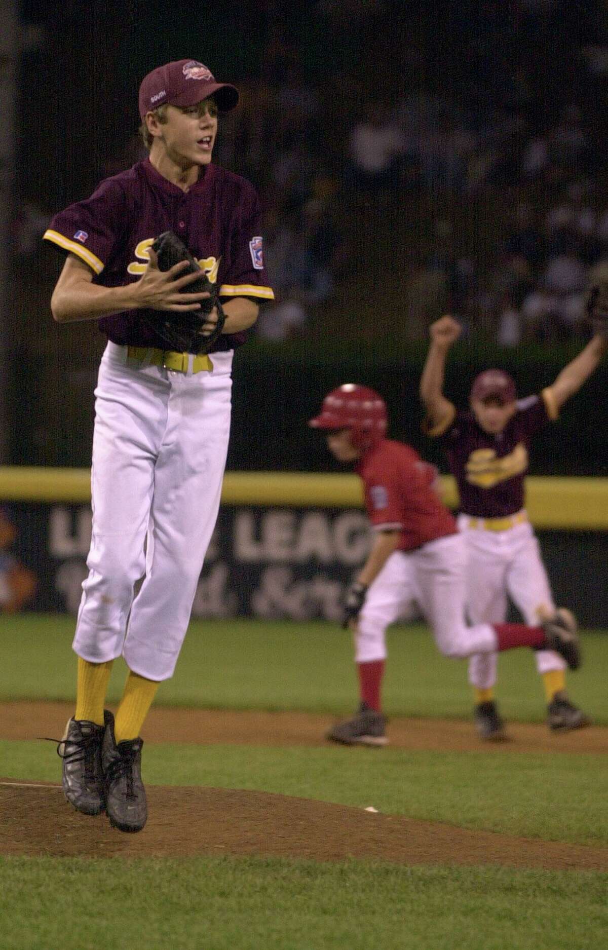 Bellaire pitcher Ross Haggard leaps off the mound after the final out in a 8-0 victory over Davenport, Iowa in the US Championship game at Howard J. Lamade Stadium in Williamsport, Pa., Thursday night, August 24, 2000 at the 2000 Little League World Series. Haggard had 13 stickouts in the game. (Smiley N. Pool/Chronicle) .