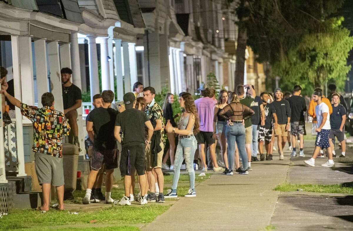 Almost two years ago, UAlbany students attend a number of house parties along the 400 block of Hudson Avenue in Albany, NY, on Friday, Aug. 28, 2020. A viral video surfaced March 27, 2022 that shows fights and large crowds in Albany. The exact location wasn't immediately clear. (Jim Franco/special to the Times Union.)
