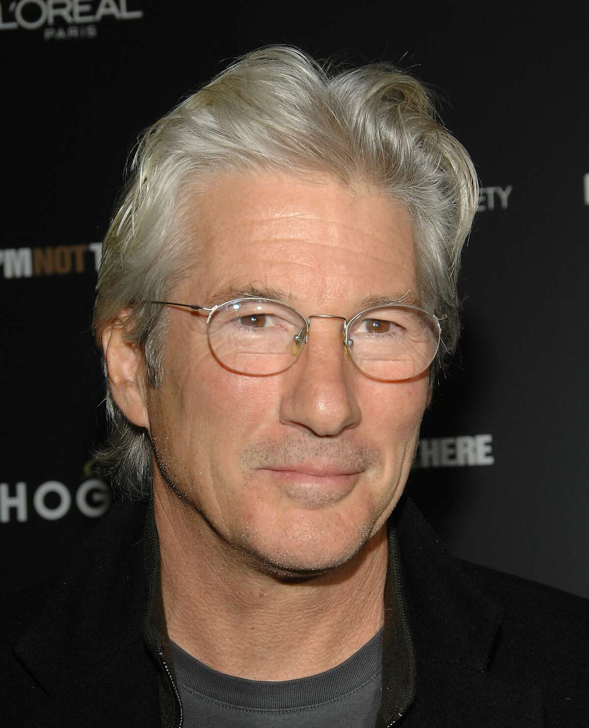 ** FILE ** Actor Richard Gere attends a special Cinema Society hosted screening of "I'm Not There" at the Chelsea West Cinemas, in this Nov. 13, 2007, file photo in New York. Gere, like Martha Stewart before him, is running into some zoning hurdles as he tries to put his imprint on the wealthy New York suburb of Bedford. Gere, the "Pretty Woman" and "Chicago" actor, and a partner have opened a cafe and bakery and have plans for a luxury inn and fine restaurant. But their new 180-foot-long cedar fence may not pass muster, Building Inspector Richard Megna said Monday, April 14, 2008. (AP Photo/Evan Agostini, file)