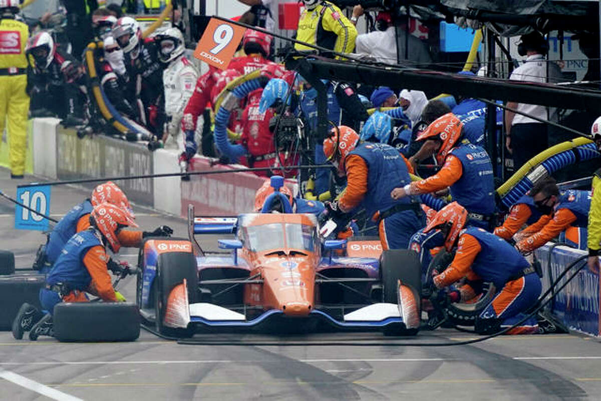 Scott Dixon pits during the IndyCar auto race at World Wide Technology Raceway on Saturday in Madison.