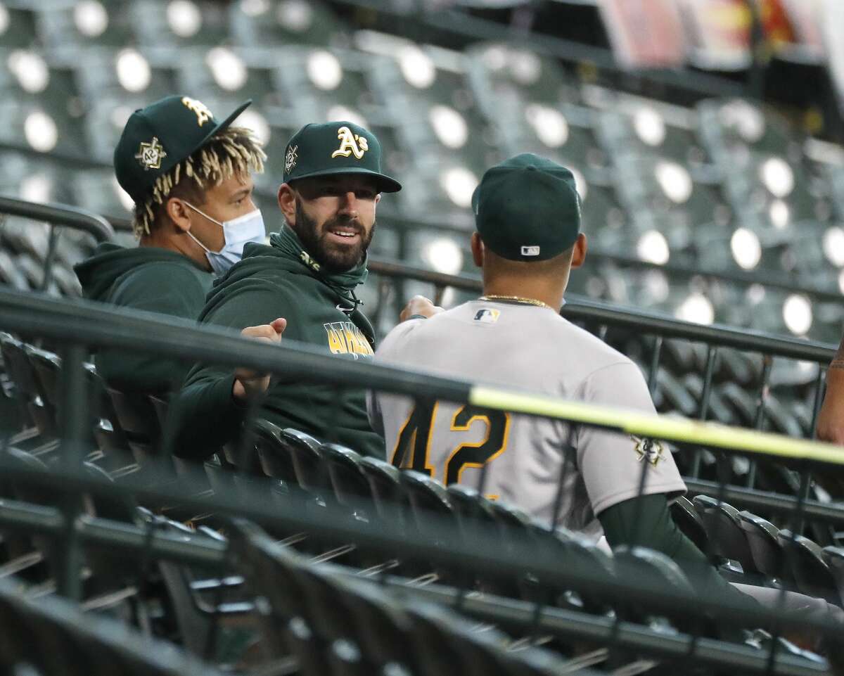 Former Houston Astros Mike Fiers sits in the stands during the first inning of the first game of an Astros-Athletics doubleheader at Minute Maid Park, Saturday, August 29, 2020, in Houston.