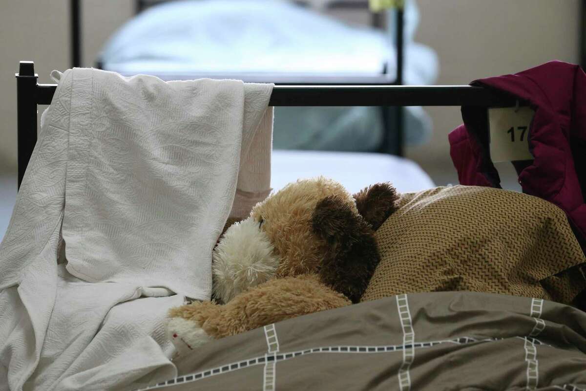 A stuffed animal is seen on a cot in the women’s section of a Salvation Army shelter, Wednesday, Aug. 26, 2020.