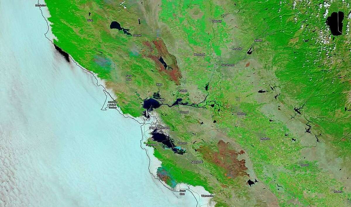 NASA's Terra satellite captured this image of the burn scars from both the LNU Lightning Complex and SCU Lightning Complex wildfires in Northern California on Aug. 26, 2020.