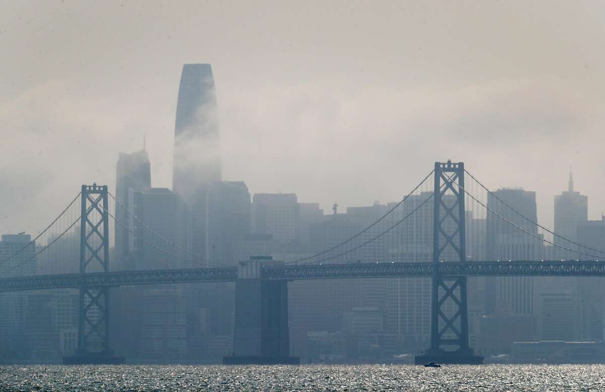 San Francisco's skyline is obscured by a mixture of smoke and fog as seen from Oakland, Calif., on Sunday, August 30, 2020.