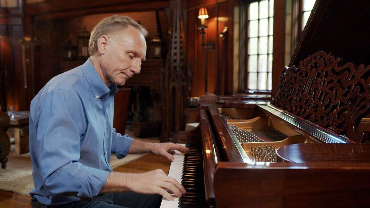 Author Dan Brown at the piano in a file photo.