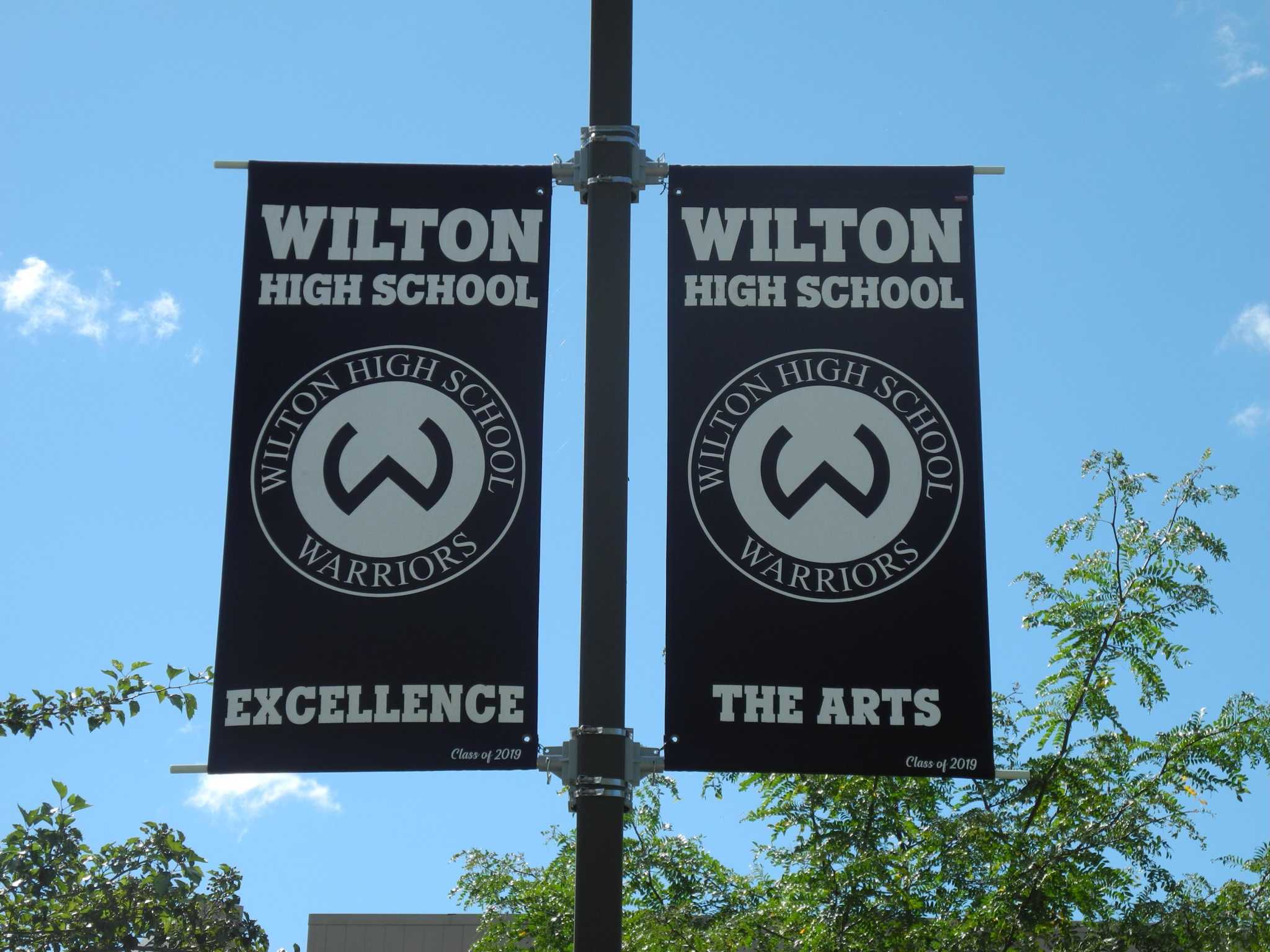 Wilton High School inducts 99 students into National Honor Society