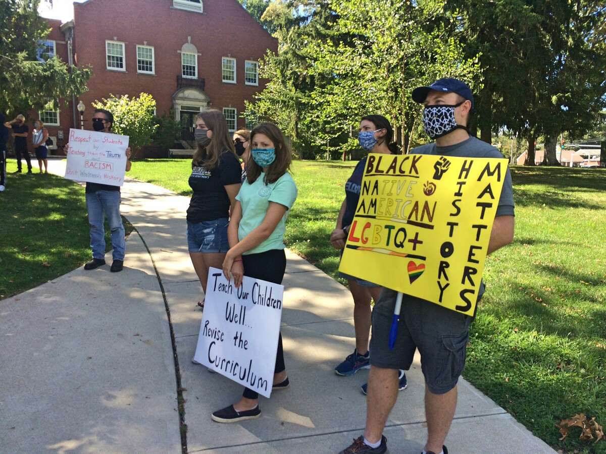 Trumbull students rallied to demand a more diverse and inclusive curriculum Sunday on Town Hall Green.
