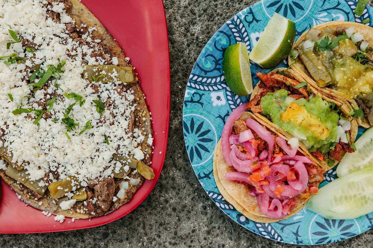 Asada and nopales huarache (left), and cochinita, al pastor, and veggie tacos at Los Carnalitos in Redwood City.