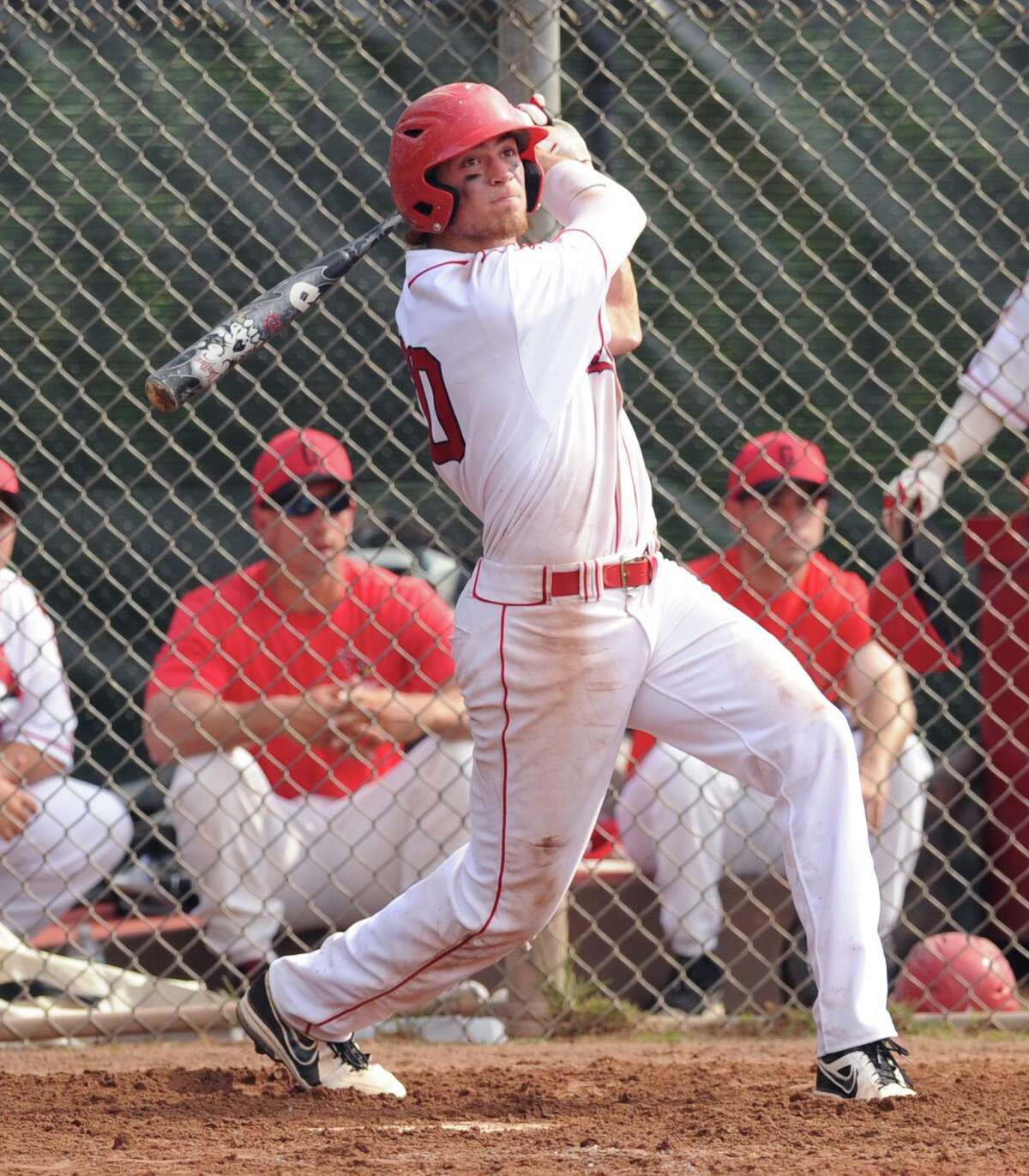 Taylor Olmstead of Greenwich hits into a fielder's choice in the bottom of the fifth inning during the Class LL boys high school baseball playoff game between Greenwich High School and Cheshire High School at Greenwich, Wednesday, May 29, 2013. Greenwich defeated Cheshire, 9-2.