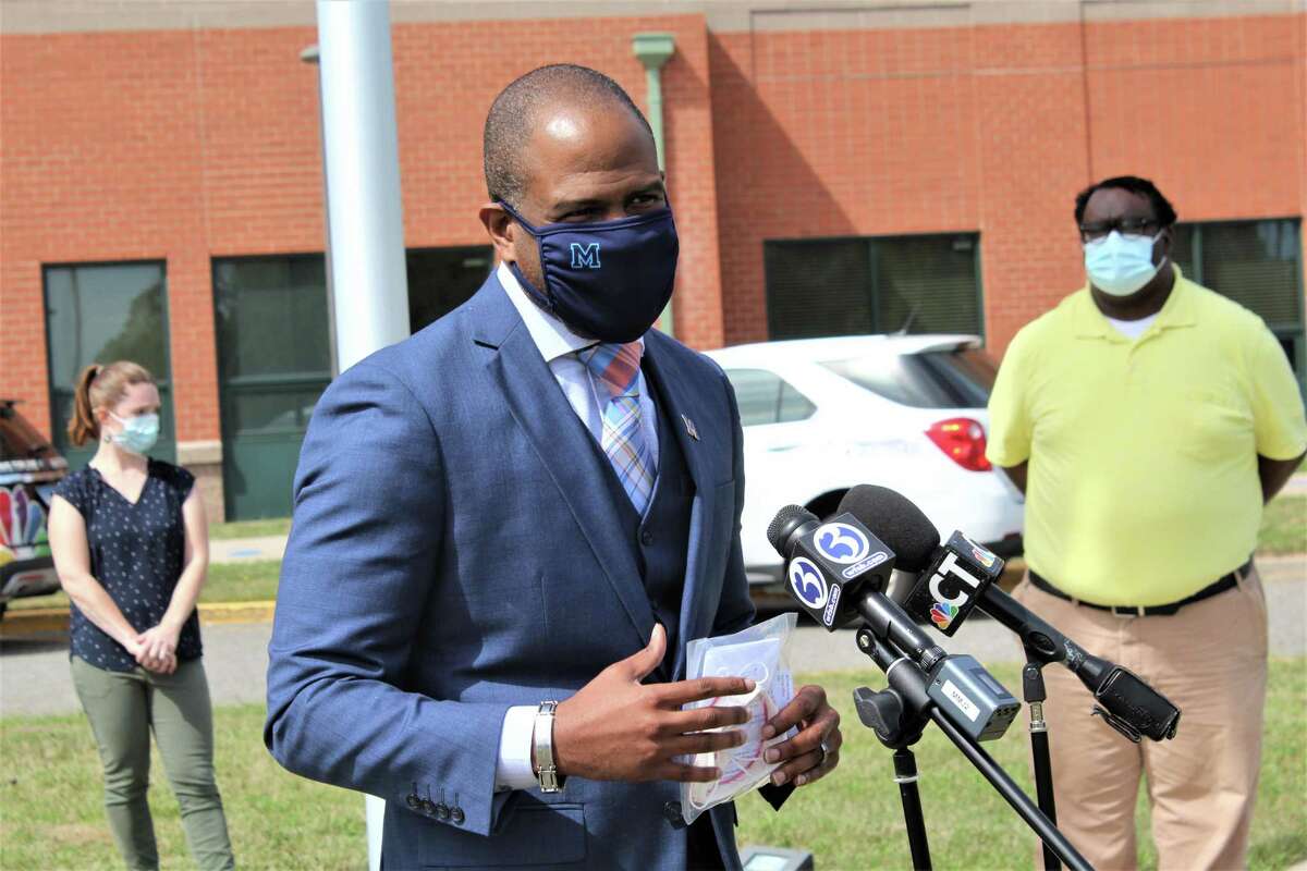Connecticut Biotech of South Windsor donated 220 custom-fitted 3D-printed Secure Fit face mask frames to Middletown Public Schools teachers Monday morning at the high school on La Rosa Lane. These are exoskeletons worn outside of a traditional surgical mask. Shown is Superintendent of Schools Michael Conner.