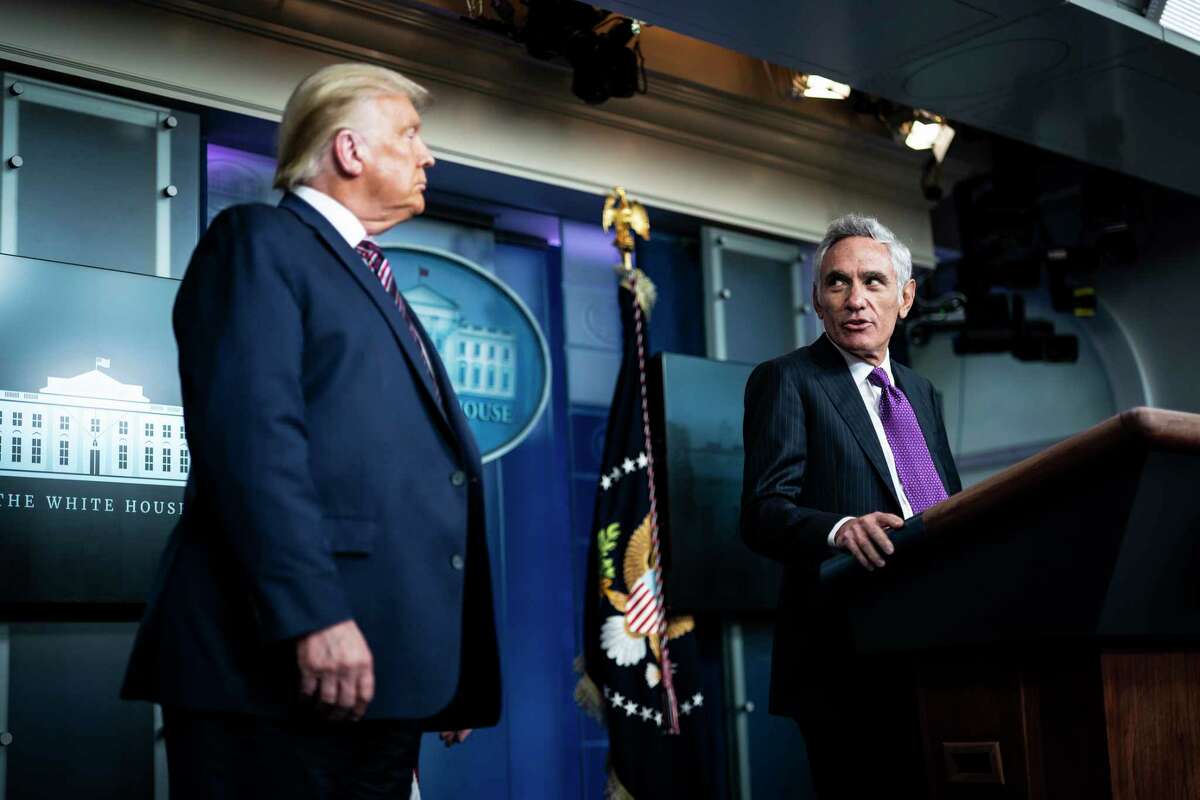Scott Atlas, senior fellow at the Hoover Institution, speaks with President Trump during a coronavirus briefing on Aug 12, 2020.