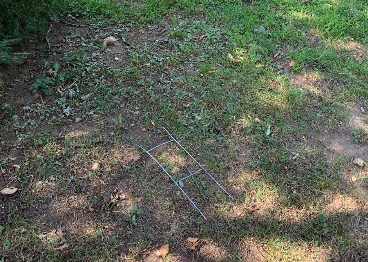 An empty frame stands where a lawn sign endorsing Republican candidate for state Senate Kim Healy was taken.