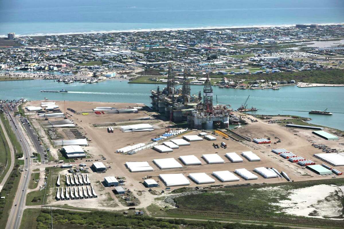 Industrial operations on Harbor Island with the popular town of Port Aransas above it. A proposal to build a terminal for giant crude haulers right across from the Port Aransas Marina and city park is drawing pushback from locals. Tuesday, Feb. 25, 2020.