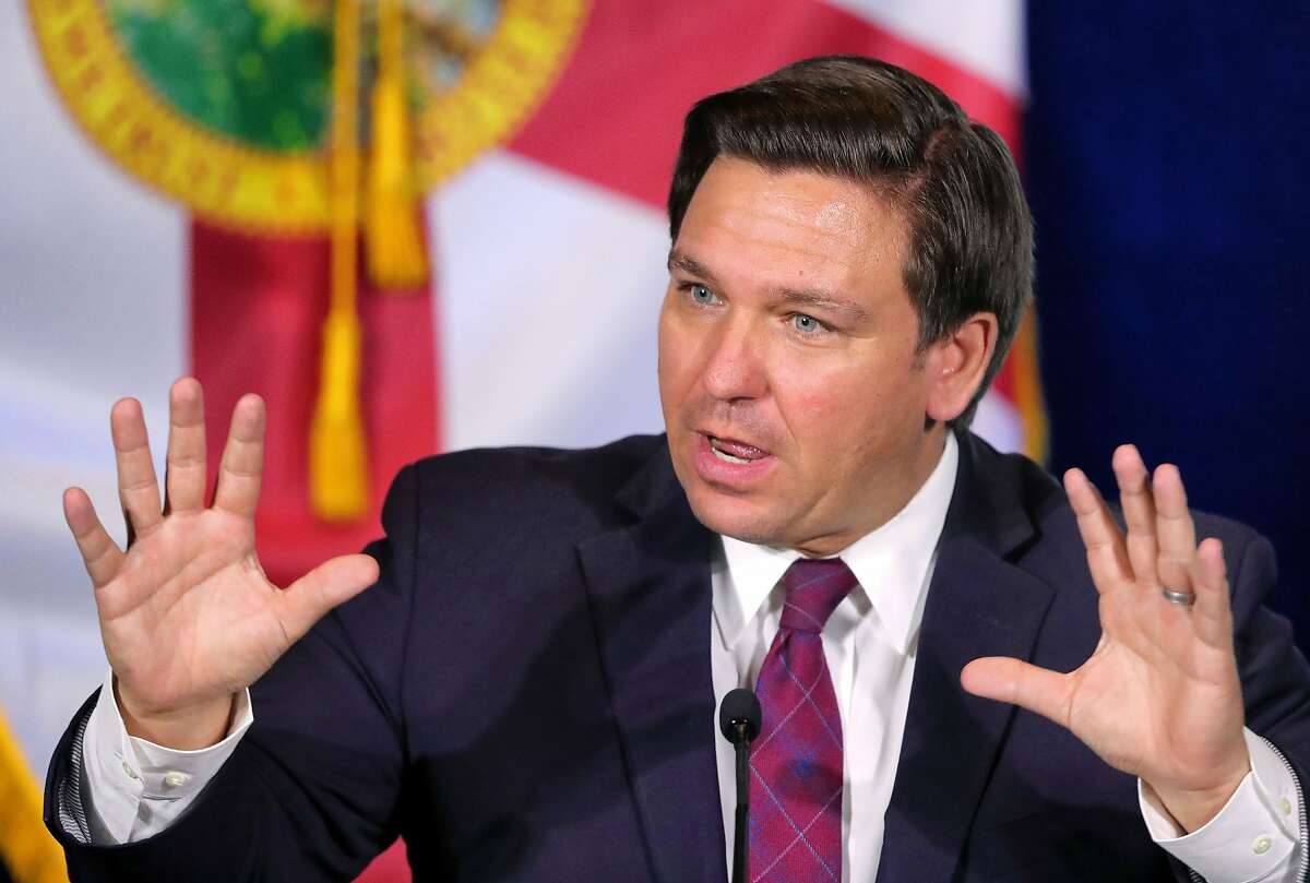 Gov. Ron DeSantis delivers remarks during a roundtable discussion with theme park leaders about safety protocols and the impact of the coronavirus pandemic, Wednesday, Aug. 26, 2020. 