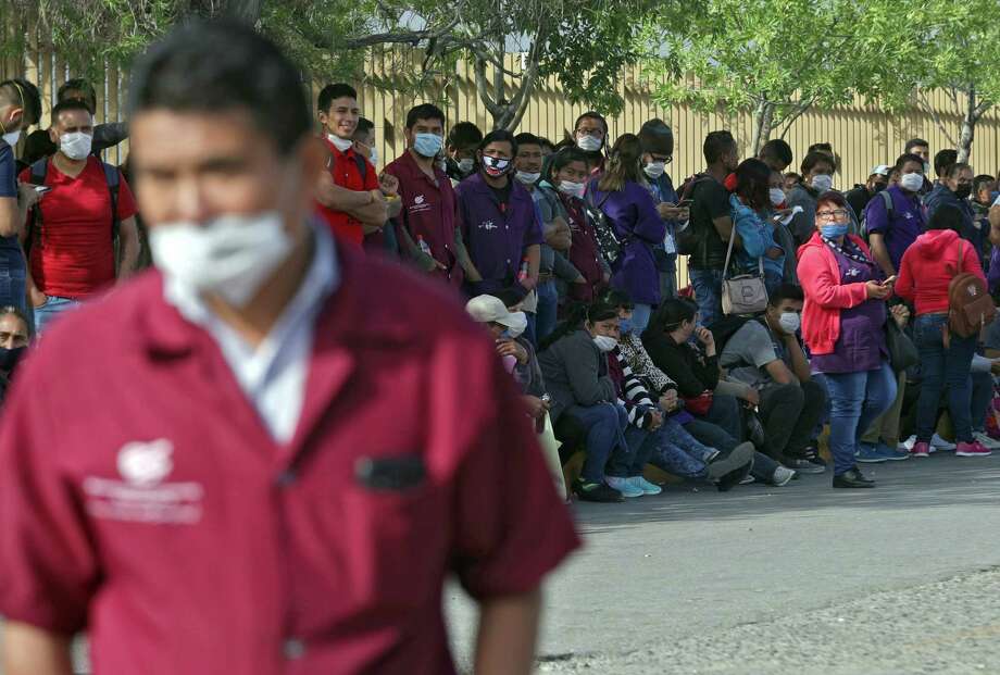 Factory workers hold a protest in April over the lack of safety measures against COVID-19 outside a maquiladora in Ciudad Juárez. The United States-Mexico-Canada agreement, or USMCA, includes labor protections for Mexican workers that are some of the strongest to date in any trade deal. But Mexican labor activists say they are hearing reports that some factories are not following the health sanitary rules during the COVID-19 pandemic. Photo: Herika Martinez /AFP Via Getty Images / AFP or licensors