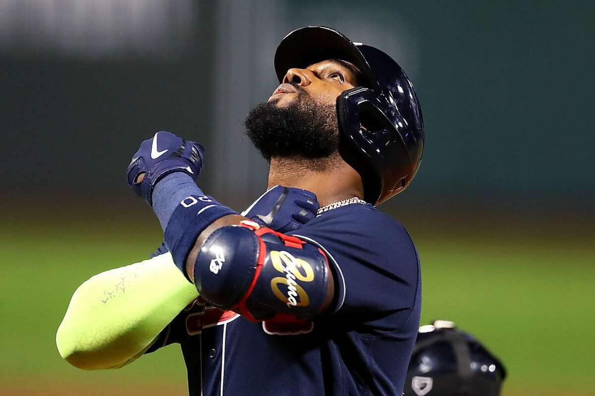 BOSTON, MASSACHUSETTS - SEPTEMBER 01: Marcell Ozuna #20 of the Atlanta Braves celebrates after hitting a home run against the Boston Red Sox during the seventh inning at Fenway Park on September 01, 2020 in Boston, Massachusetts. (Photo by Maddie Meyer/Getty Images)