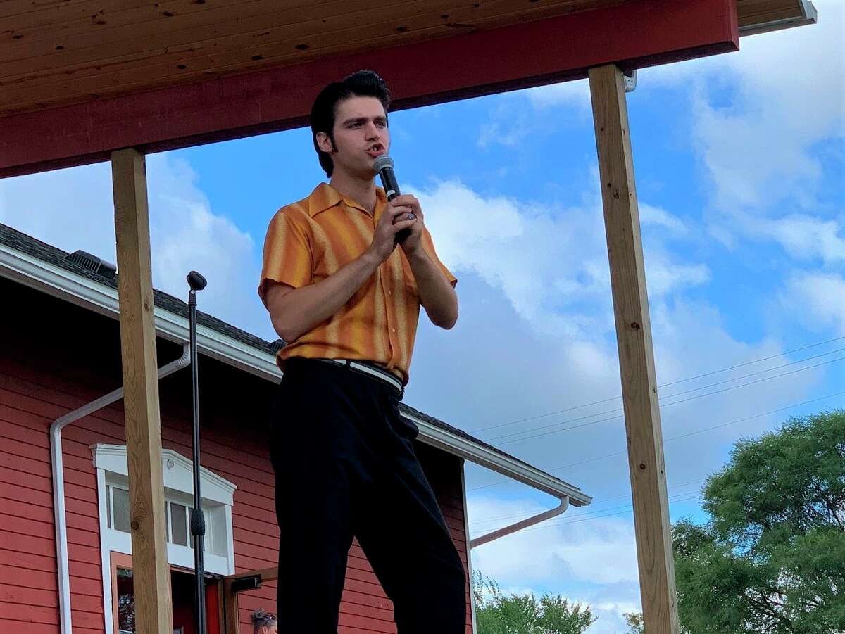 With the infamous Elvis moves and well known lip curl, Jake Slater gives the crowd at Evart Depot a real Elvis experience as he performs. (Herald Review photo/Cathie Crew)