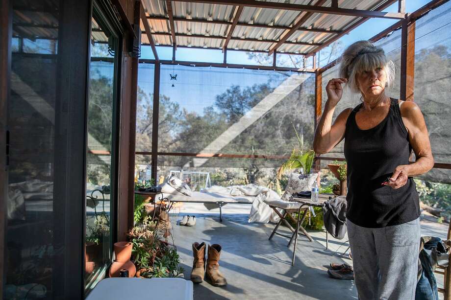 Suzy Parker at her home along Mix Canyon Road on Thursday, Aug. 27, 2020, in Vacaville, Calif. The LNU Lightning Complex fires are 35% contained and have been active for 10 days, according to CalFire’s latest report Thursday. The fires have burned more than 370,000 acres. Parker and her spouse were given mandatory orders and evacuated in time. Their home survived the fire. Photo: Santiago Mejia / The Chronicle