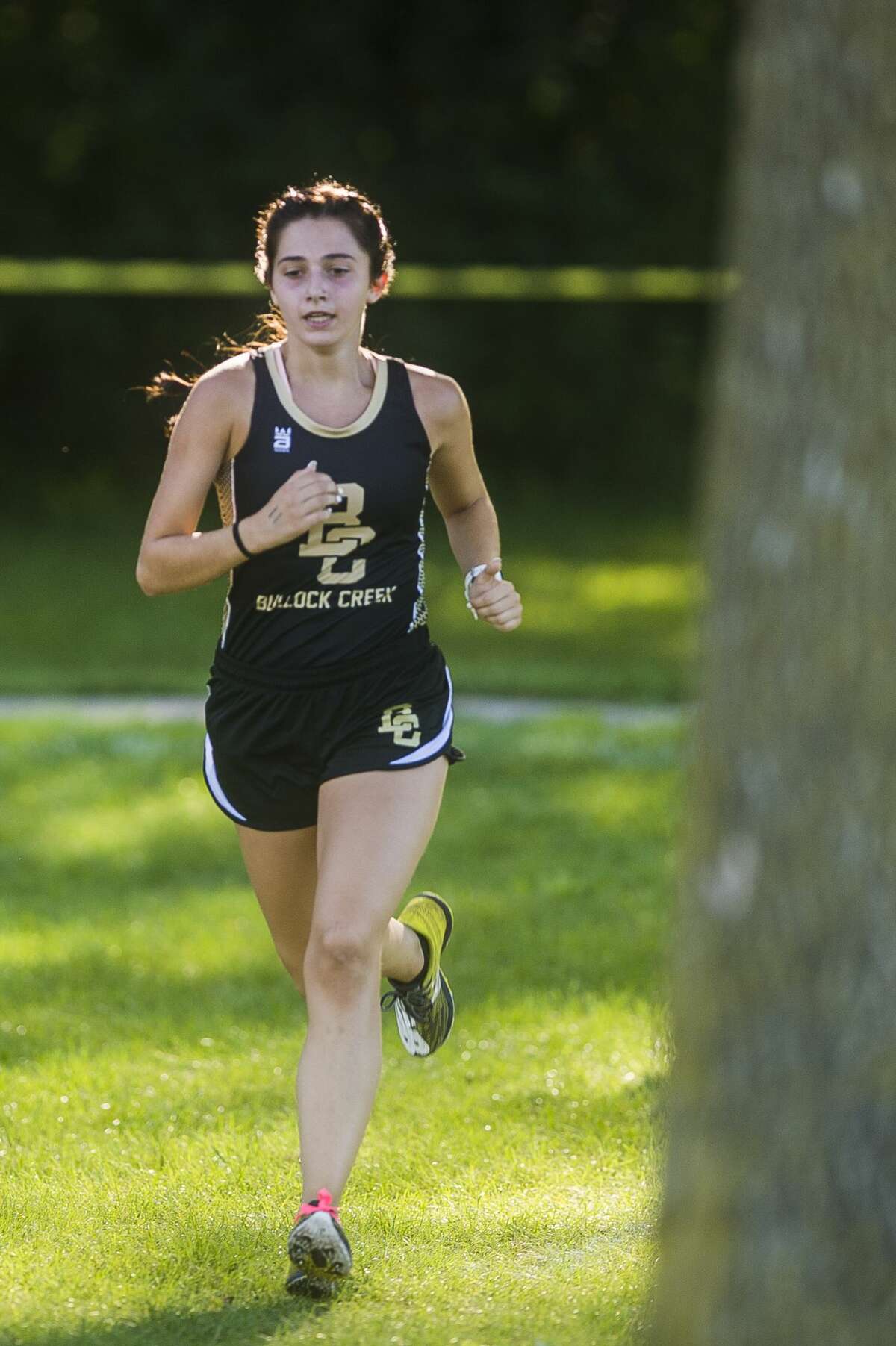 Bullock Creek's Rita Gorsuch competes in a cross country meet against runners from Dow, Meridian and Midland Wednesday, Sept. 2, 2020 at Stratford Woods Park in Midland. (Katy Kildee/kkildee@mdn.net)