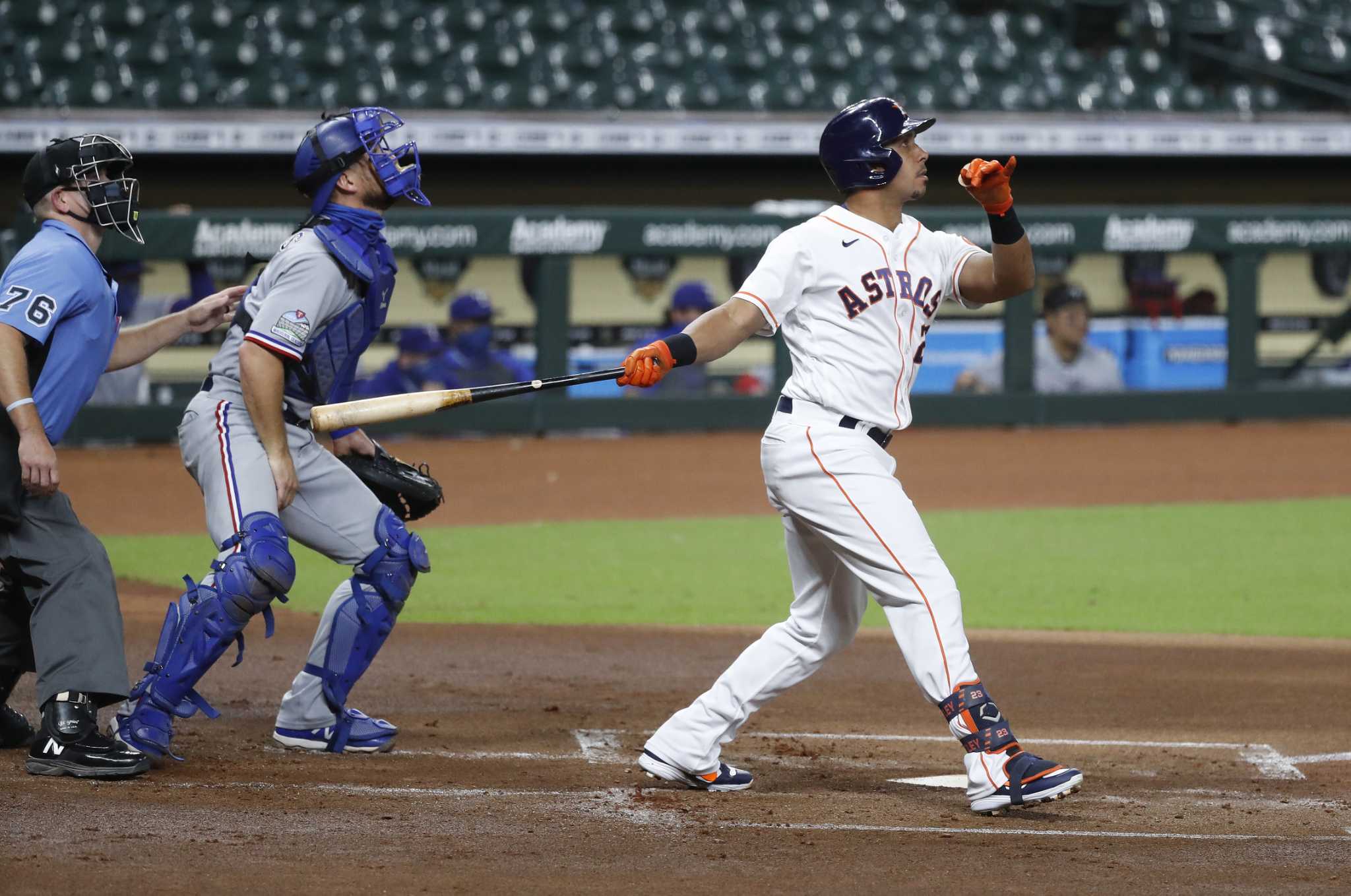 Michael Brantley homers early, Astros hold on for win over Texas