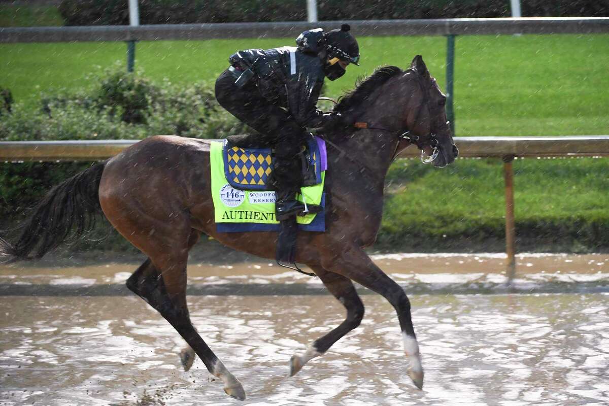 Authentic gallops over a very muddy track at Churchill Downs Thursday Sept. 3, 2020 In Louisville, KY. Photo by Skip DicksteinSpecial to the Times Union