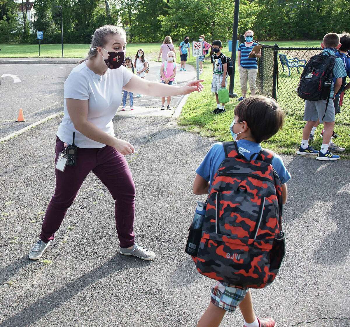 Photos: ‘School comes alive again’ on first day in Darien