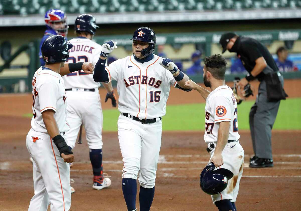 Houston Astros' Aledmys Diaz celebrates his solo home run with