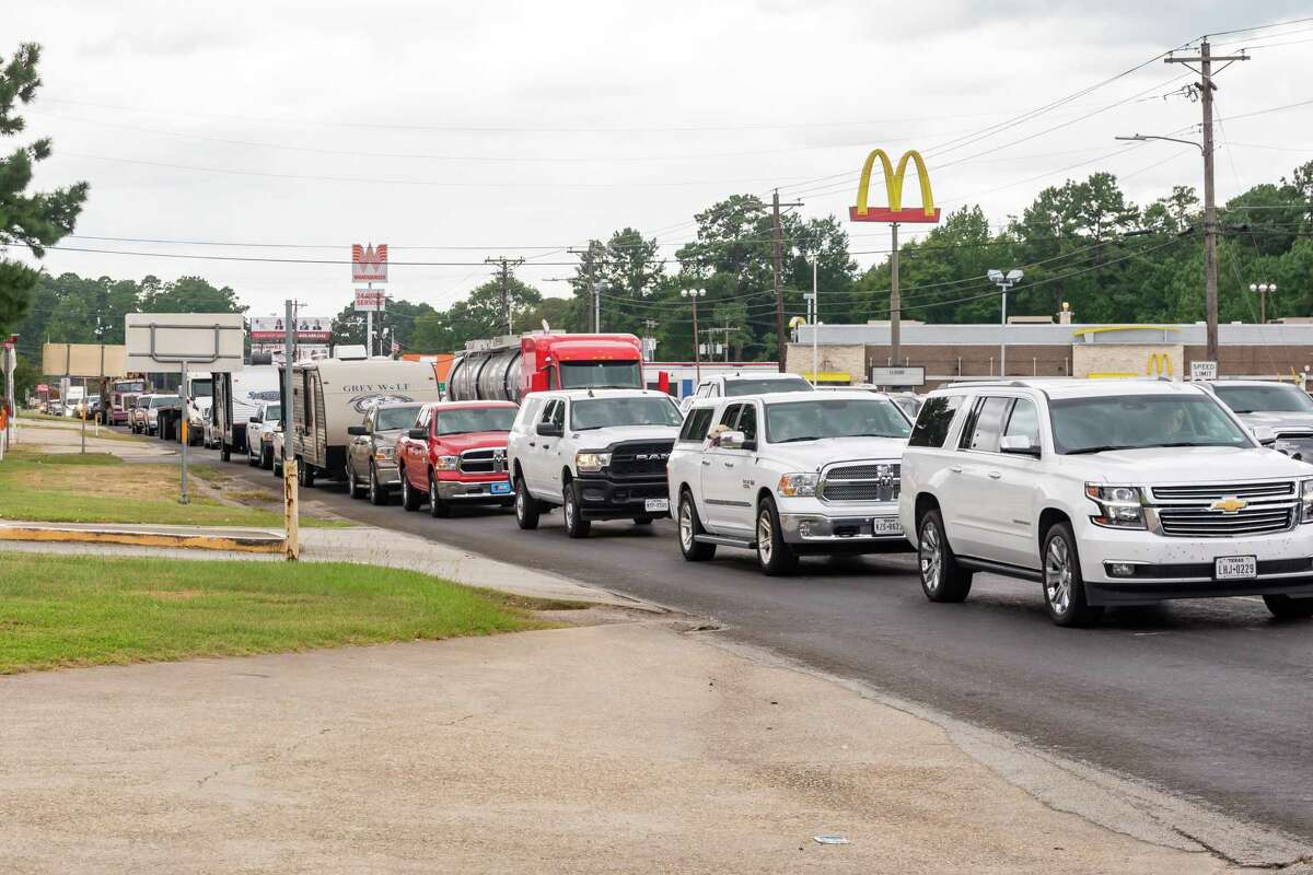 Evacuation traffic backs up in Jasper where US 190 & US 69. The northbound line of vehicles stretched through town on Tuesday afternoon. The largely rural, pine-canopied communities of Jasper and Newton counties find themselves facing a threat more common to coastal communities Photo made on August 25, 2020. Fran Ruchalski/The Enterprise