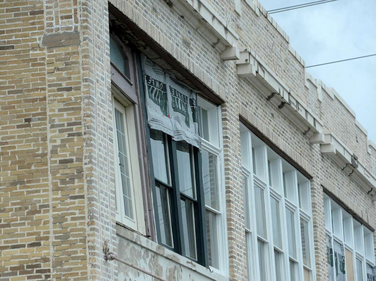 A bank of windows are pushed in from the wall of a historic building in Orange a week after the area was hit with some of the most severe damage in Southeast Texas by Hurricane Laura. Photo taken Thursday, September 3, 2020 Kim Brent/The Enterprise