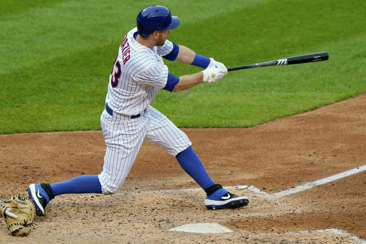 New York Mets' Todd Frazier hits a double during the fourth inning of the team's baseball game against the New York Yankees, Thursday, Sept. 3, 2020, in New York. (AP Photo/Kathy Willens)