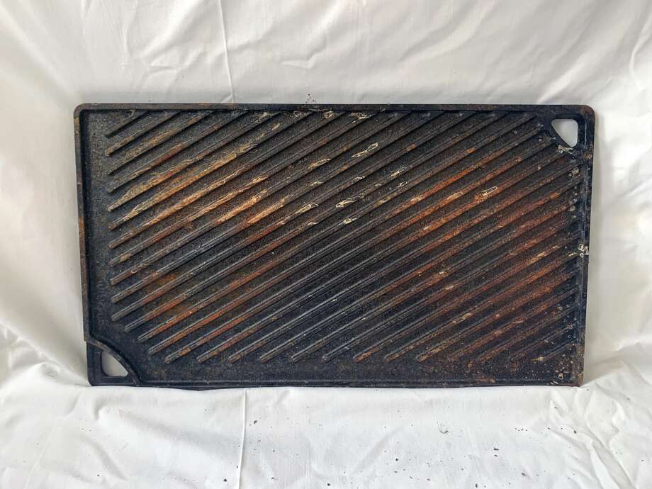 The grill side of this double-sided griddle had accumulated a fair amount of surface rust. Photo: Ryan Craggs