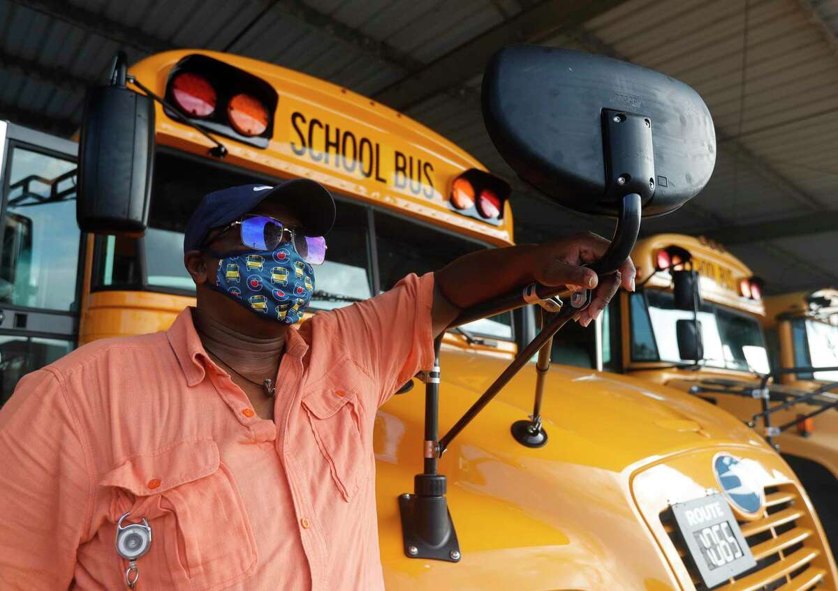 Conroe ISD bus driver Curtiss Chambers poses for a portrait at the district’s transportation department, Friday, Sept. 4, 2020, in Conroe. The district will run more than 400 routes when it begins in-person classes Tuesday, Sept. 8.