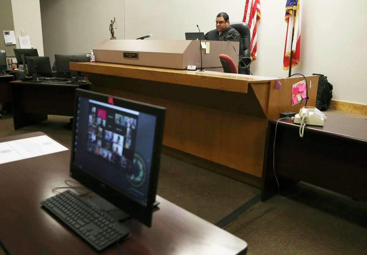 Juvenile District Judge Carlos Quezada, 289th Juvenile District Court, holds a videoconference on Wednesday, Sept. 2, 2020 with two physicians so that youth who have cases in his court can ask questions about COVID-19 and can get answers from doctors. Quezada says there is too much misinformation out there and he is concerned that young people - who already feel invincible - are getting COVID-19 fatigue and letting their guards down.