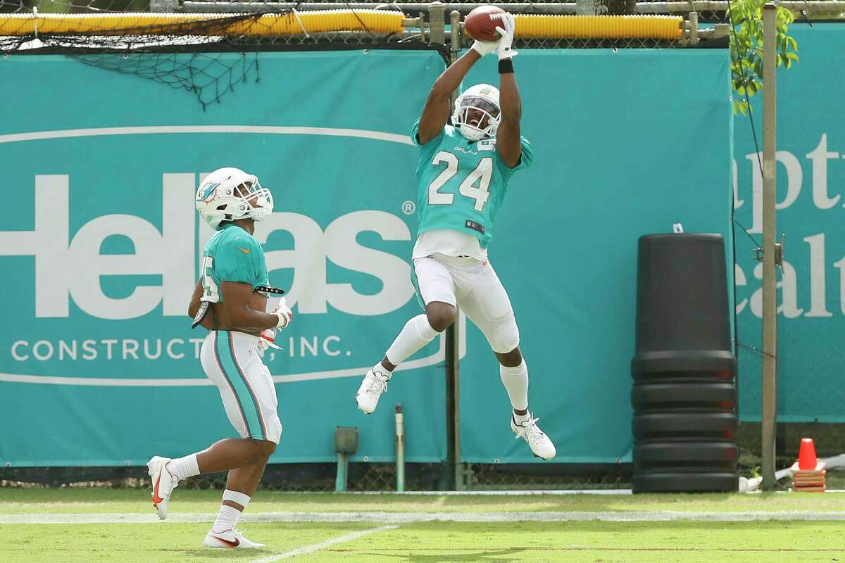 New Britain native and former UConn star Byron Jones of the Miami Dolphins catches a pass during a drill during training camp at Baptist Health Training Complex at Nova Southern University on August 24.